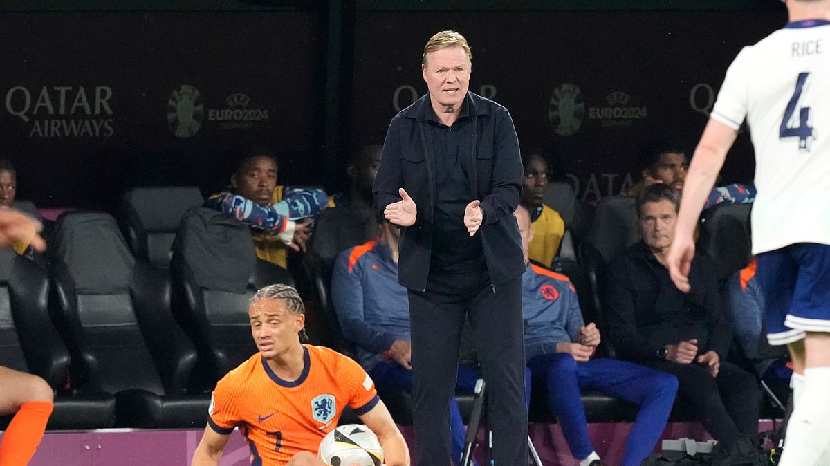  (AP Photo/Frank Augstein) : Netherlands head coach Ronald Koeman gestures during a semifinal match between the Netherlands and England at the Euro 2024 soccer tournament in Dortmund, Germany, Wednesday, July 10, 2024.